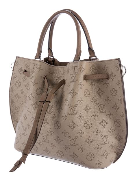 louis vuitton hold everything|louis vuitton mahina bag.